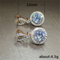 Round Clear Solitaire Halo Drop Earrings In Gold And Silver Tones view 5