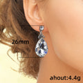 Clear Teardrop Crystal Dangle Earrings in Silver Tone view 4