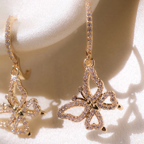 Rose Gold Tone Butterfly Drop Earrings With Clear Stones, alternate angle.