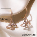 Rose Gold Tone Butterfly Drop Earrings With Clear Stones view 5
