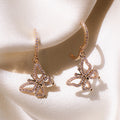 Rose Gold Tone Butterfly Drop Earrings With Clear Stones view 1