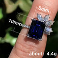 Blue Rectangular Stone Floral Halo Ring in Silver Tone view 5