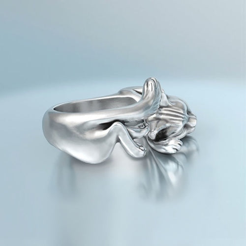 Rear side silver cat ring showing body curve and tail wrap