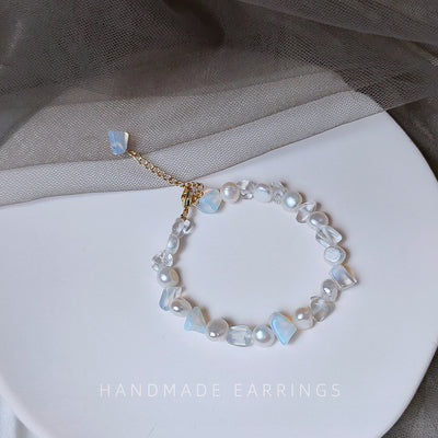 White-pearl iridescent-shell chip bracelet shown as the full bracelet.