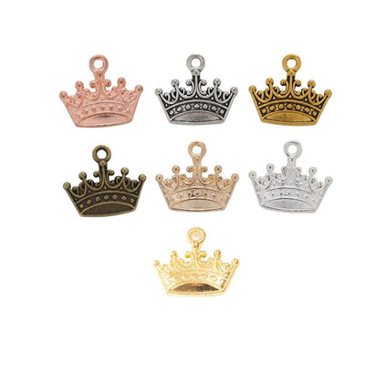 Overview of crown charm pieces on a white background
