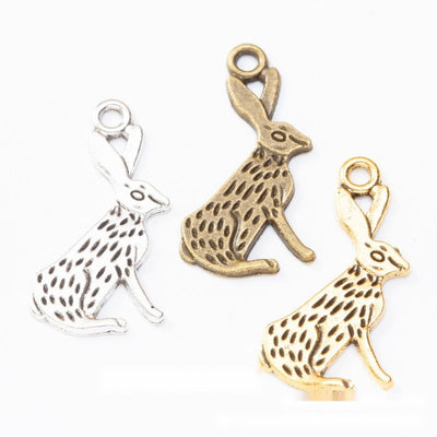 Overview of long ear rabbit charms in the available designs and finishes