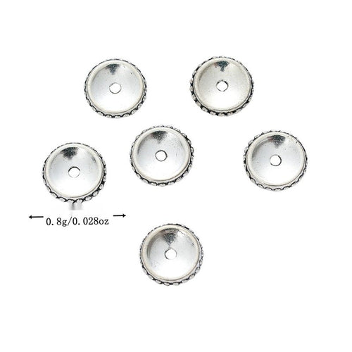 Group view showing the available finishes of round saucer spacer beads