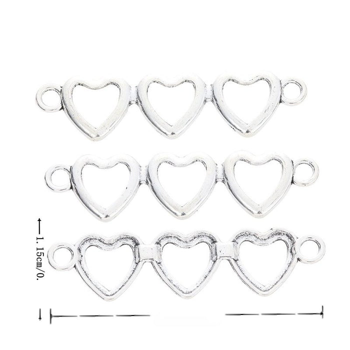 Triple Open Heart Connector in Antique Silver Tone