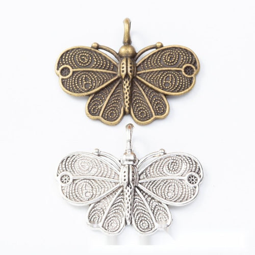 Detailed Butterfly metal piece shown in product image 1