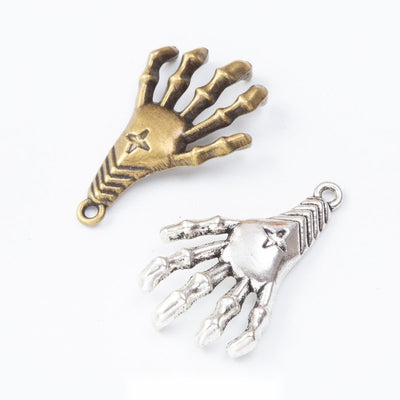 Product view of skeleton hand connector showing an articulated skeleton hand with bone details and loops at the wrist an