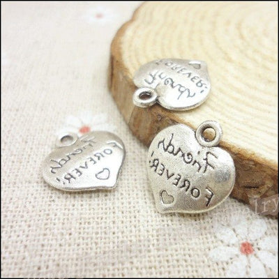 sister always heart metal charm in antique silver finish shown together in the available finishes