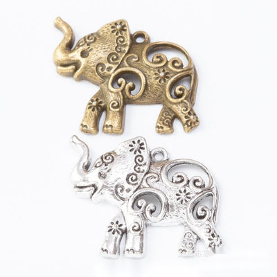 Floral Swirl Elephant Metal Charm Pendant shown in the available visible finishes