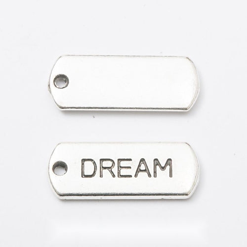 dream rectangular message tag charm shown from the front in the available metallic finishes