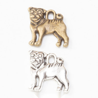 Pug dog metal component, grouped front view on white