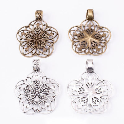 Filigree Flower Medallion Pendant finish comparison showing a layered round flower with pierced petals