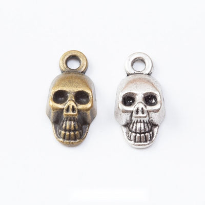 Group view of a dimensional skull face has dark recessed eye and tooth details