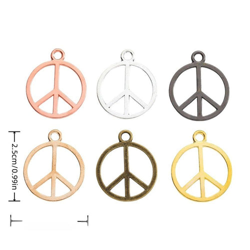 Overview of peace sign charm pieces on a white background