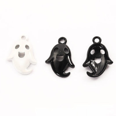 Finish comparison of 黑白珐琅鬼魂 charm on a white background