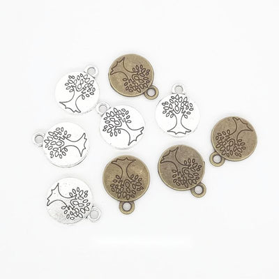Front comparison of round tree of life metal component in 2 finishes