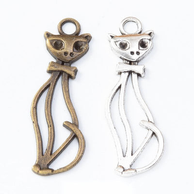 Front comparison of openwork sitting cat metal component in 2 finishes