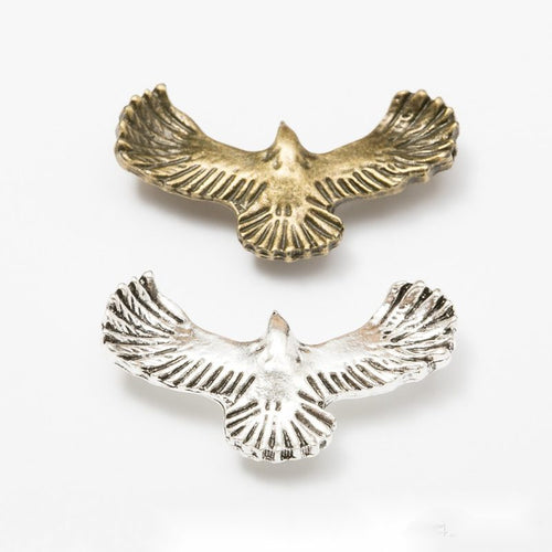 Grouped front view of the spread wing eagle multi loop metal connector in all pictured styles