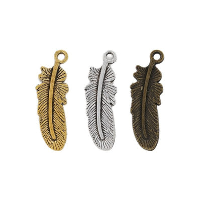 Feather metal component, grouped front view on white