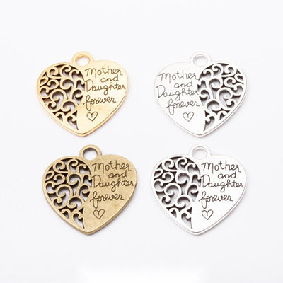 Mother and Daughter Forever Heart Metal Charms in multiple metallic finishes displayed together on a white background.