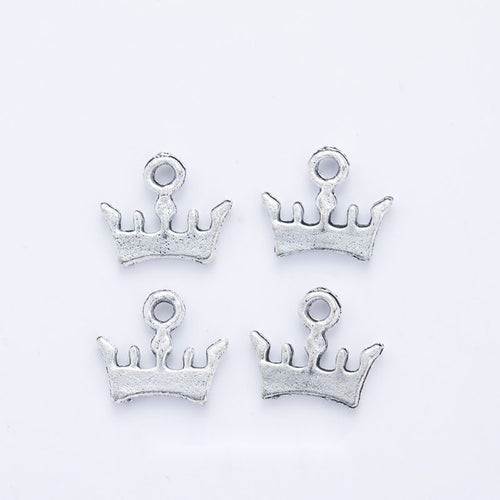 Mini Crown Charm finish assortment on a white background