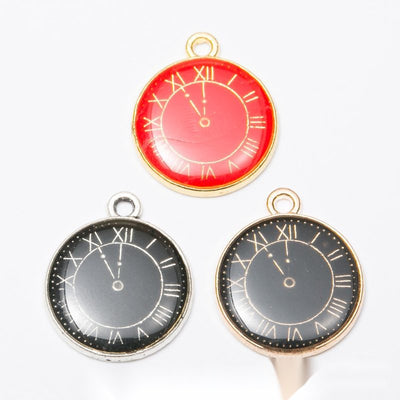 Grouped front views of clock face charms