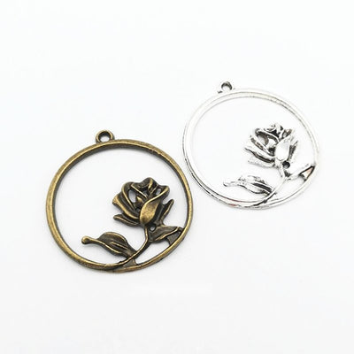 Rose In Circle Charm Pendant finish comparison showing a stemmed rose suspended inside a round frame