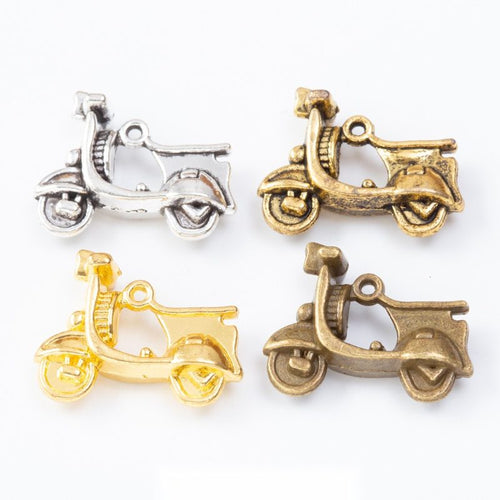 Classic Scooter Metal Charms in Four Metallic Finishes in multiple metallic finishes displayed together on a white backg