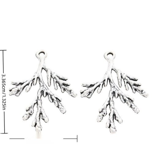 Branch Sprig metal charm displaying front and reverse sides