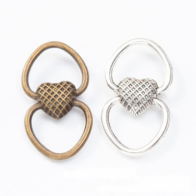 Overview of double loop heart connectors in the available designs and finishes