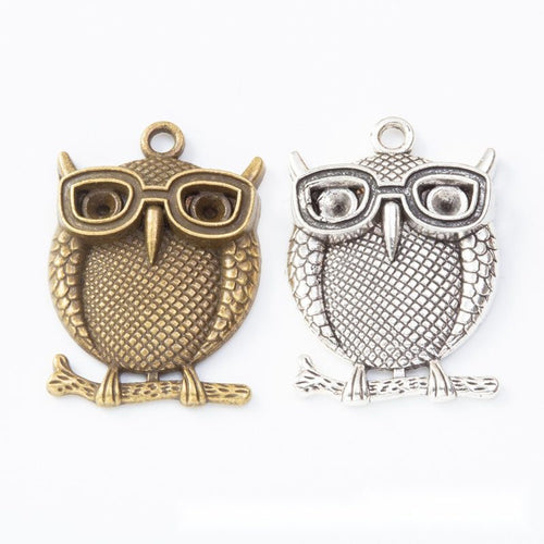 Overview of owl charms in the available designs and finishes