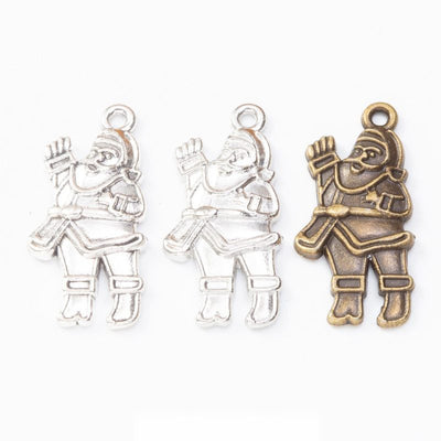 Santa Claus Charm finish comparison on a white background