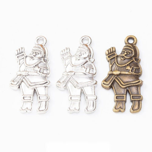 Santa Claus Charm finish comparison on a white background