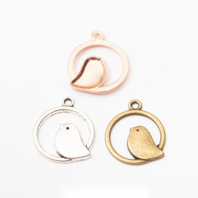 Bird in Round Frame metal pieces shown in the available finishes.