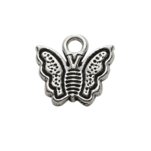 Tiny Framed Butterfly Charm shown in all pictured finishes on a white background