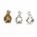 Penguin Pendant Charm In Antique Bronze And Silver view 1