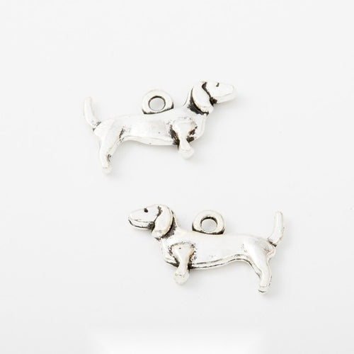Upturned-Tail Dog metal piece showing overall shape and available finishes