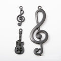Music Note and Guitar Black Metal Charms in Three Designs view 1