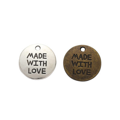 Finish overview of made with love round metal charm