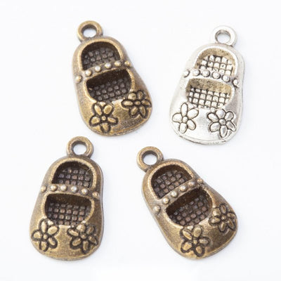 Front and finish comparison of floral shoe charm