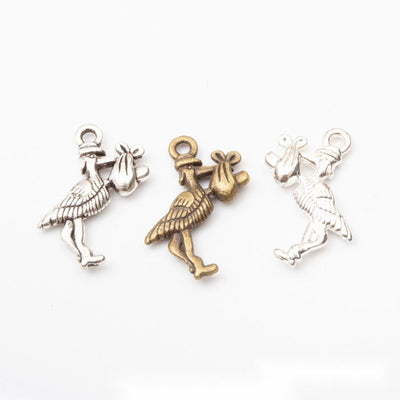 Standing Bird Textured Metal Charm Pendant shown in the available visible finishes