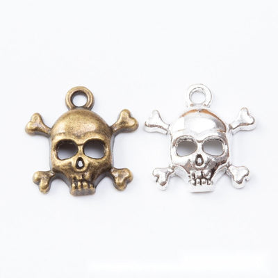 Front view of skull-and-crossbones charm showing finish variation 1
