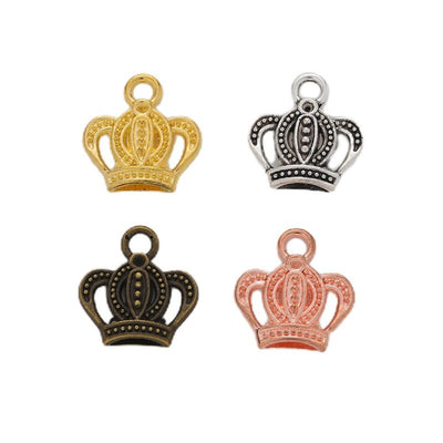Grouped front views of the openwork crown metal charm in four metallic finishes