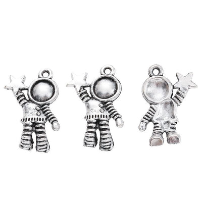 Astronaut With Star Charm shown in the available metal finishes on white
