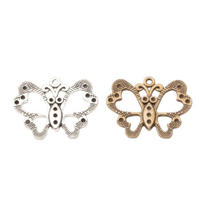 Rounded Openwork Butterfly Metal Charm Pendant shown in the available visible finishes