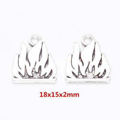 Flame metal component, grouped front view on white
