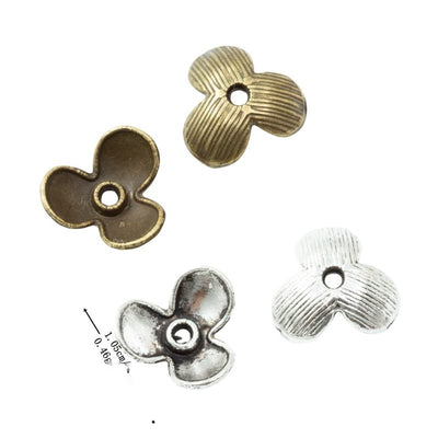 Front and finish comparison of three-petal bead cap
